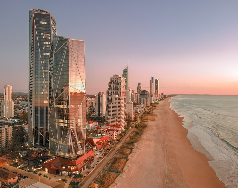 a view of a beach with a city in the background