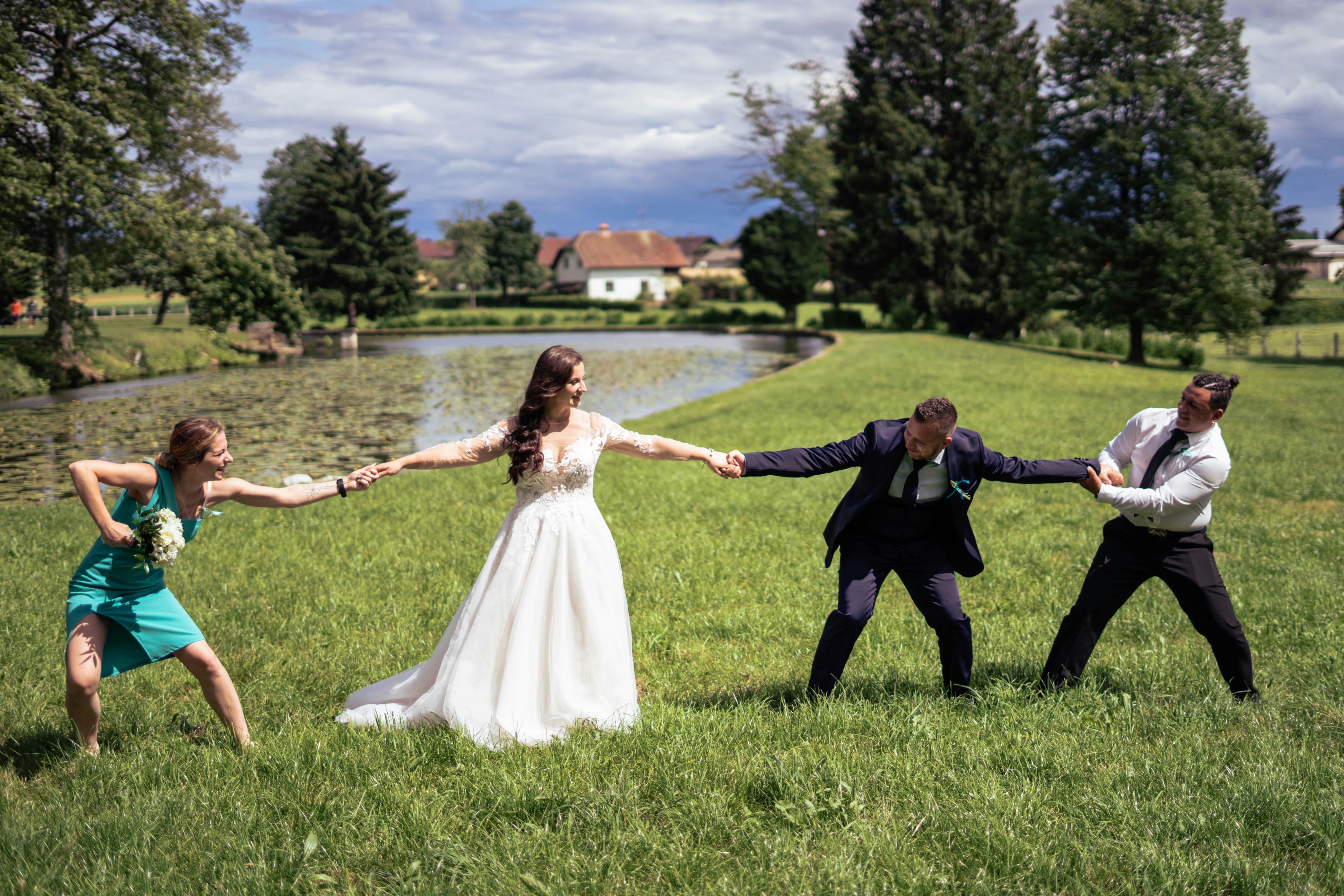 a group of people holding hands in a field