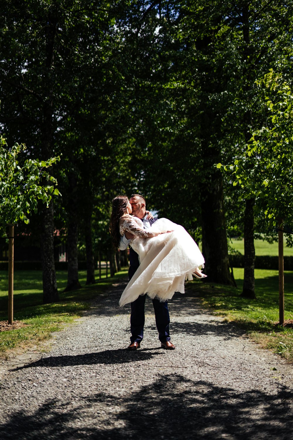 a man carrying a woman on his back