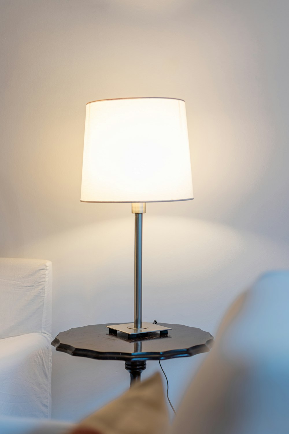 a lamp on a table in a room