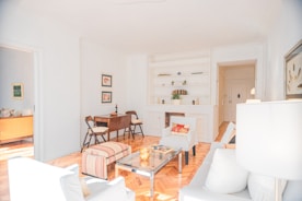 Handcrafted wooden furniture pieces in a bright living room