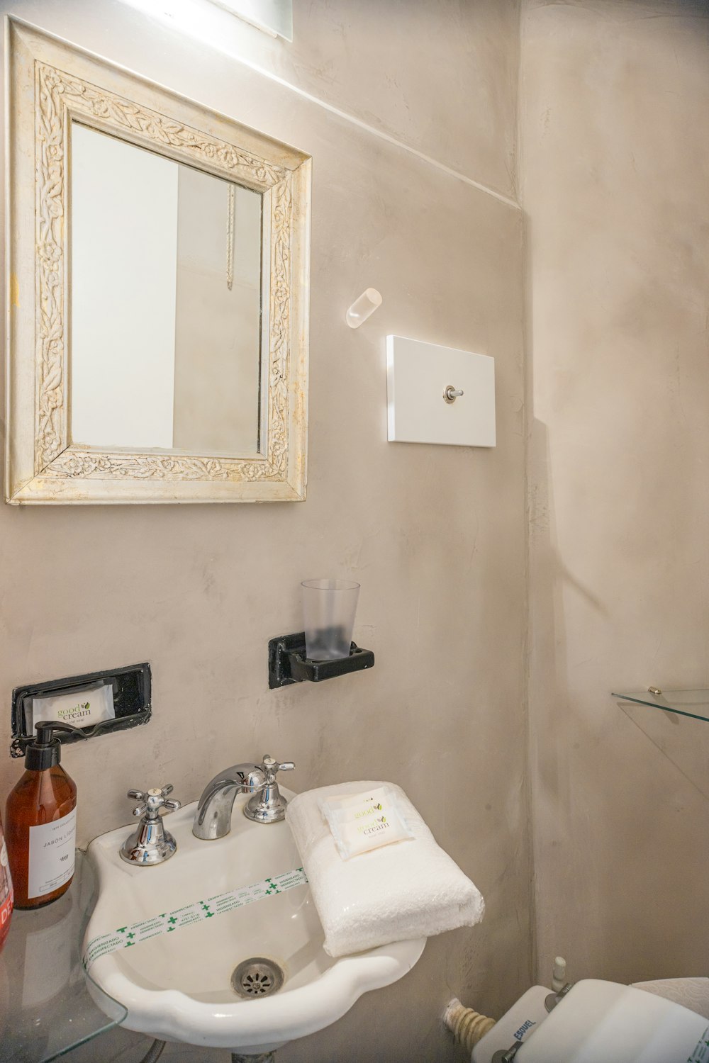 a bathroom with a sink and a mirror