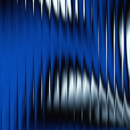 a blue and white abstract background with lines