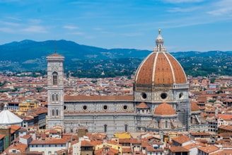 A panoramic view of Florence’s red rooftops and the iconic Duomo cathedral.
