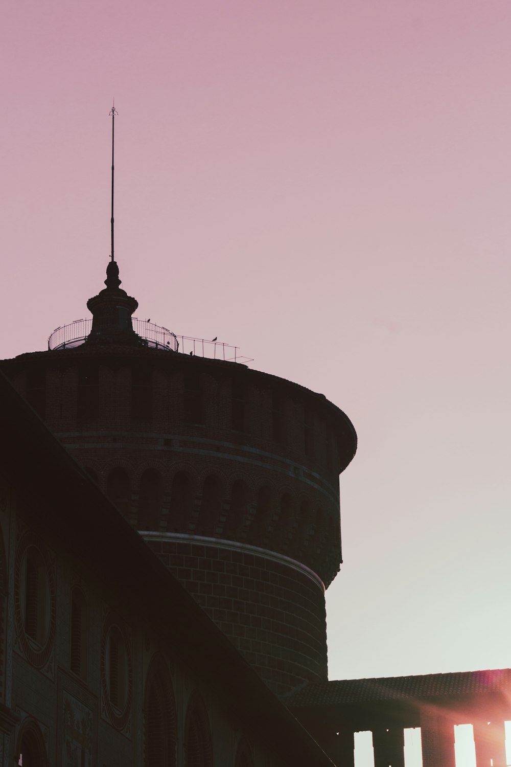 a tower with a clock on top of it