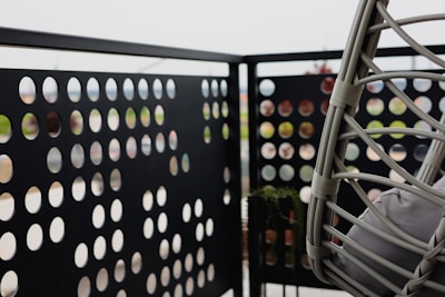 Different designs of balcony safety nets displayed.