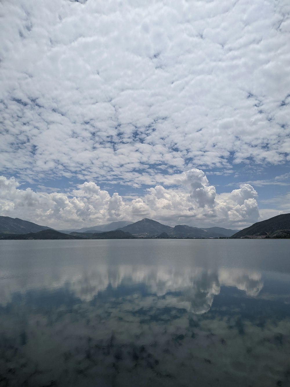 a large body of water surrounded by mountains