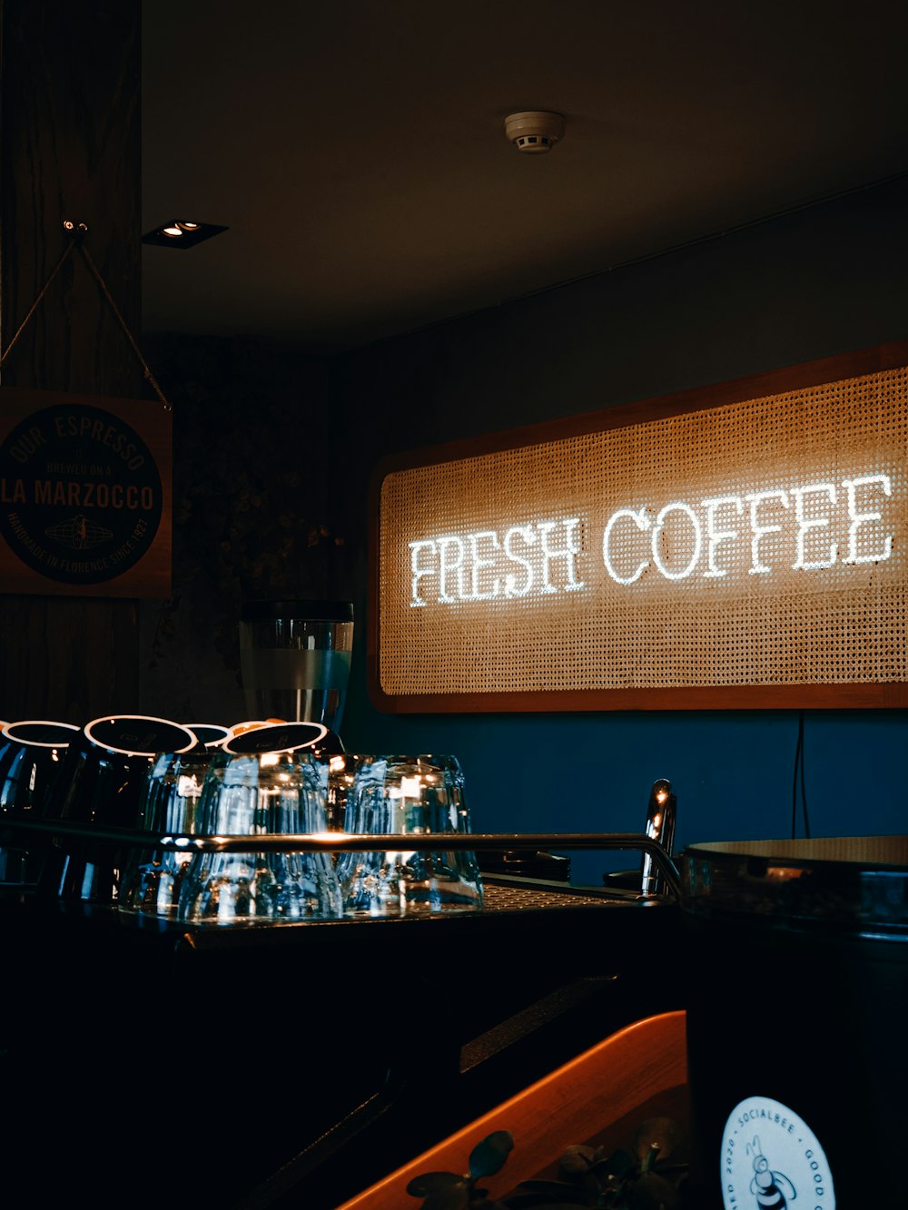 a coffee shop with a sign that says fresh coffee