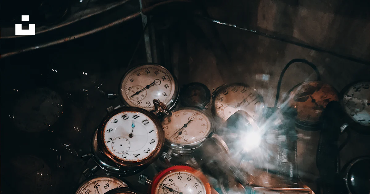 A bunch of clocks sitting on top of a table photo – Free Baku Image on ...