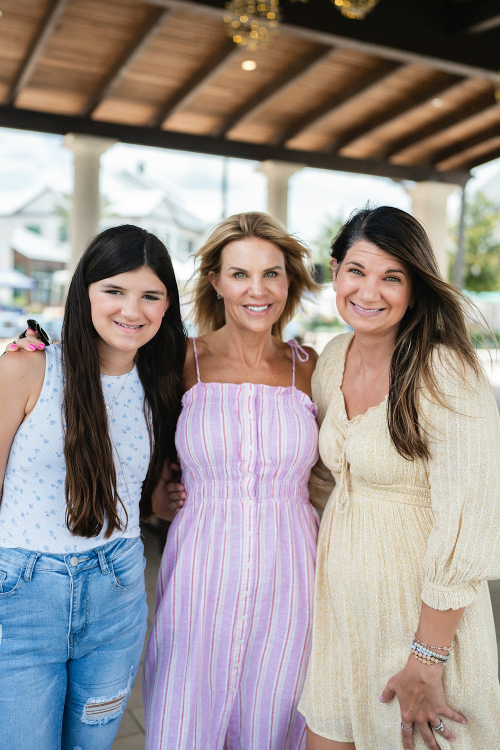 a group of women standing next to each other