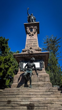 Historic statue symbolizing freedom and legacy in Pénjamo at sunset.