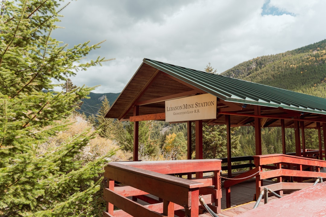 a wooden structure with a sign on top of it,