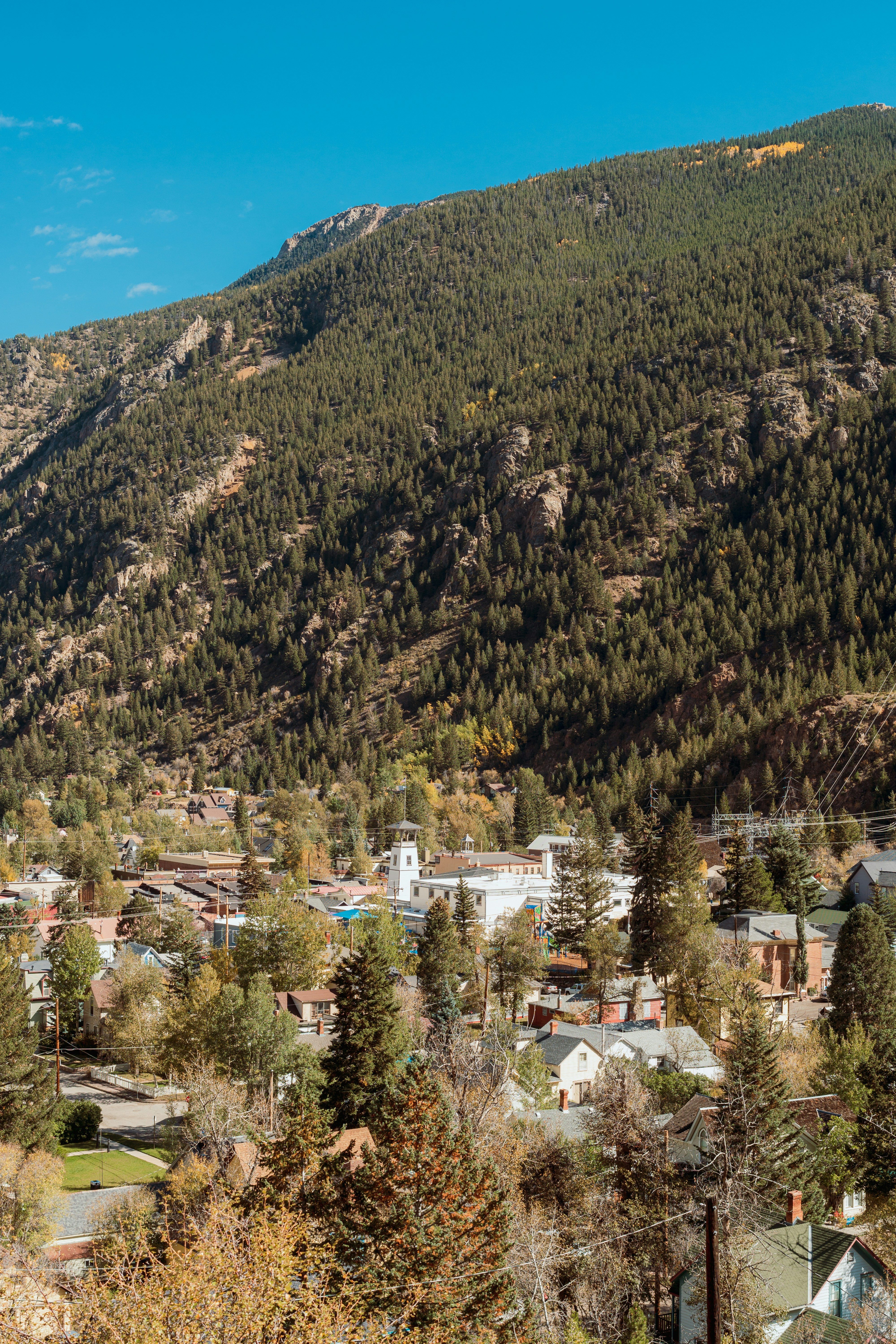 a view of a small town in the mountains