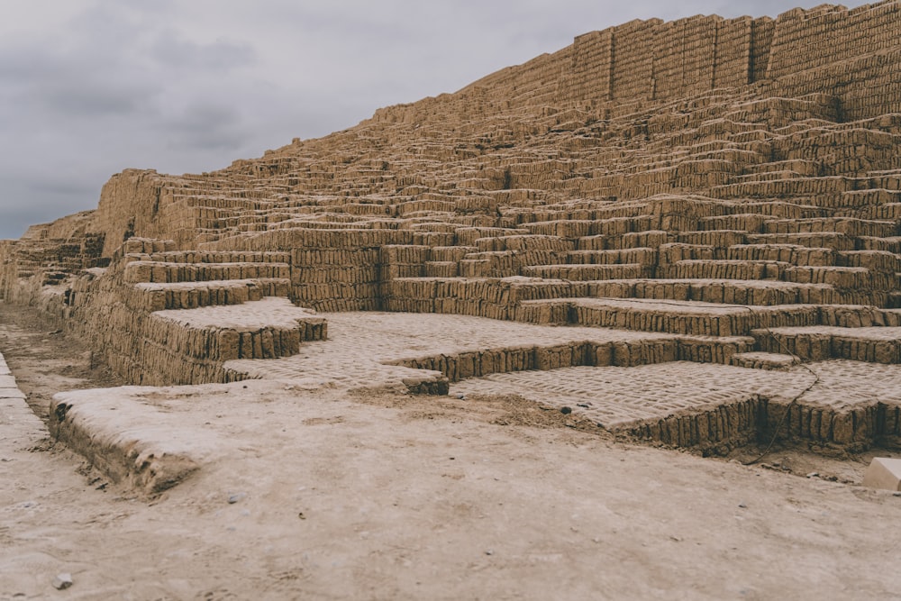 a large stone structure with steps leading up to it