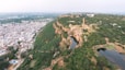 an aerial view of a city and a river