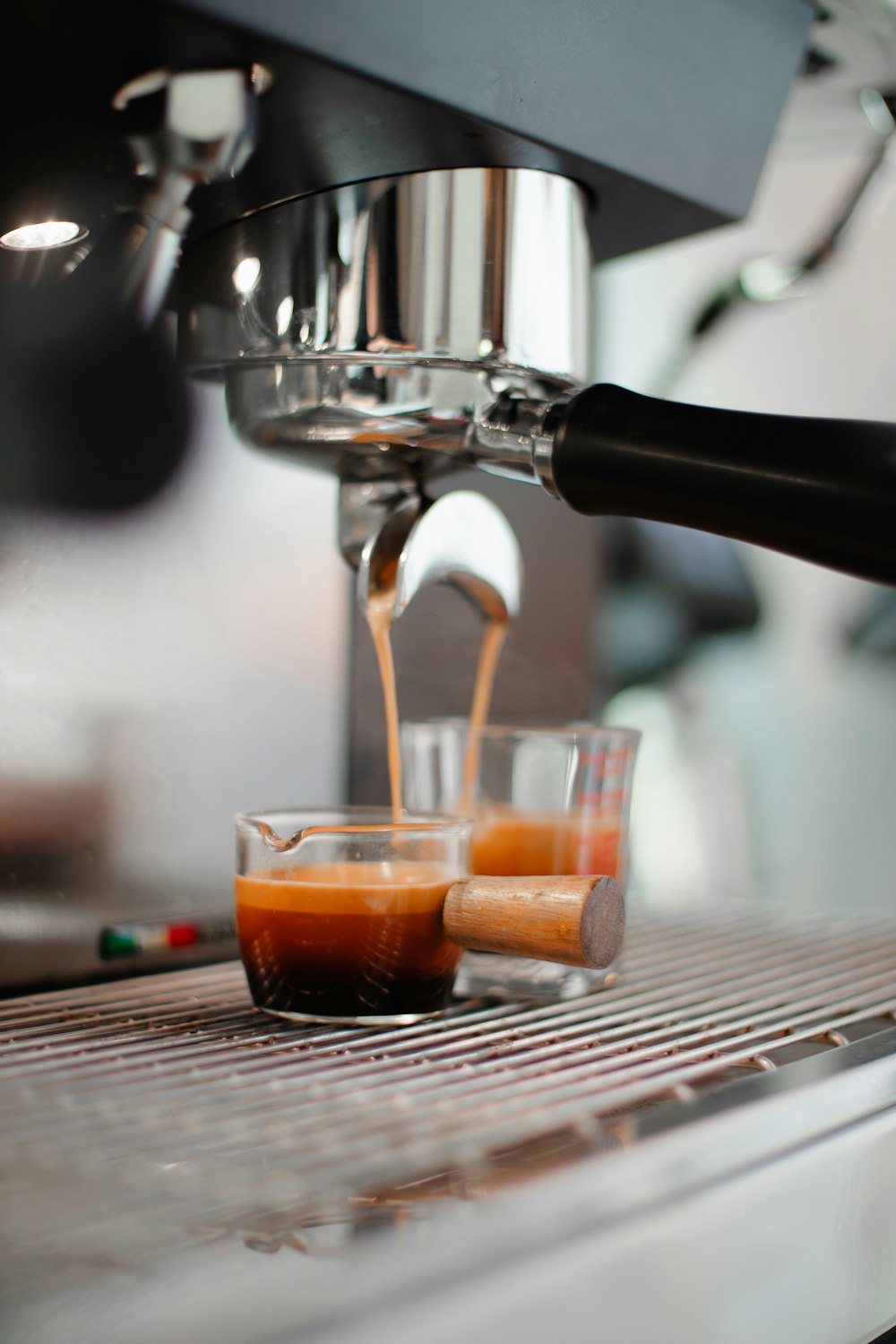 a espresso machine making a cup of coffee