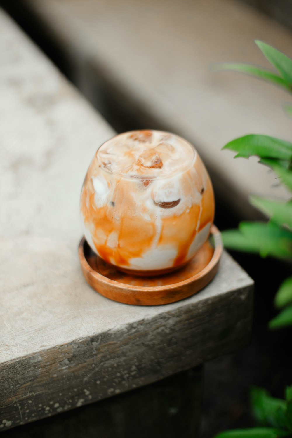 an orange and white object sitting on top of a wooden table