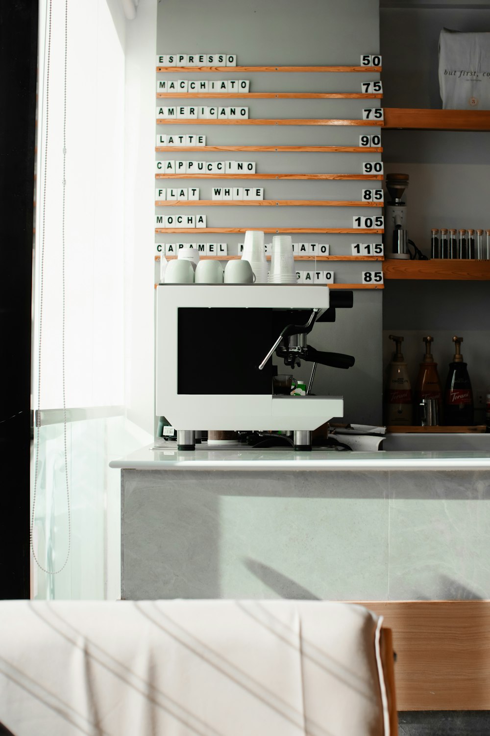 a coffee machine sitting on top of a counter