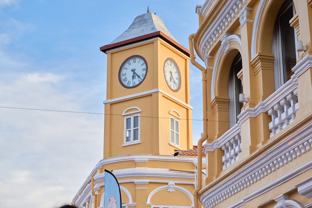 a clock tower on the corner of a building