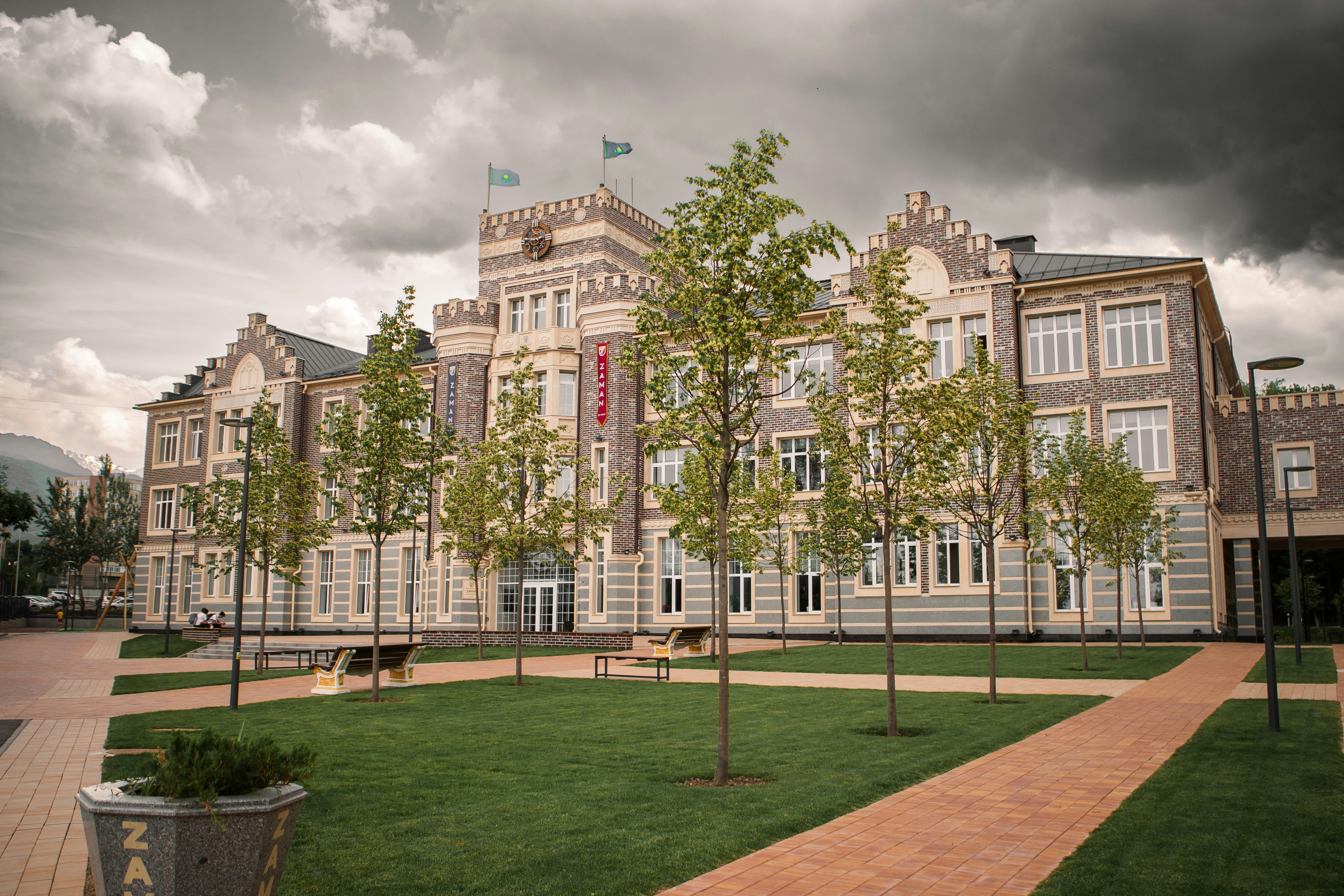 a large building with trees in front of it