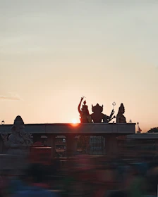 Devotees offering prayers at the Mahakaleshwar temple in Ujjain during sunset.