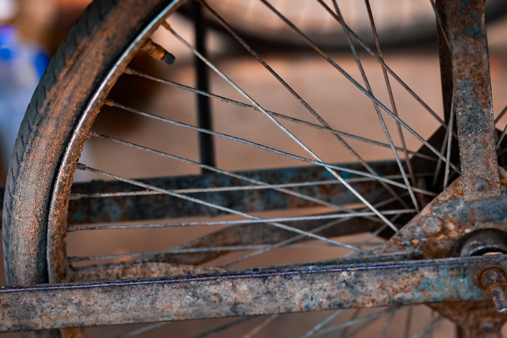 a close up of an old bicycle wheel