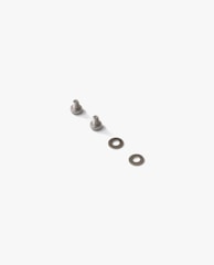 a pair of screws sitting on top of a white surface