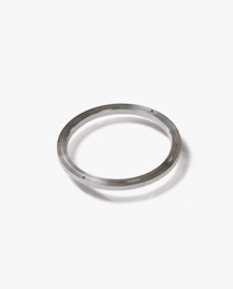 Close-up of a stainless steel E-type retaining ring highlighting its smooth finish and precise edges.