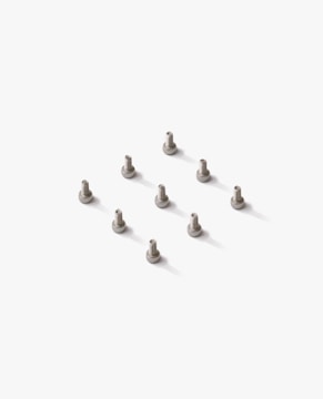 a set of six screws sitting on top of a white surface