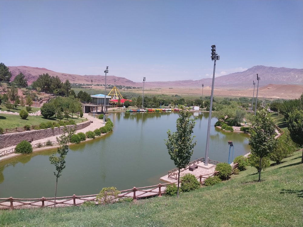 a pond in the middle of a park