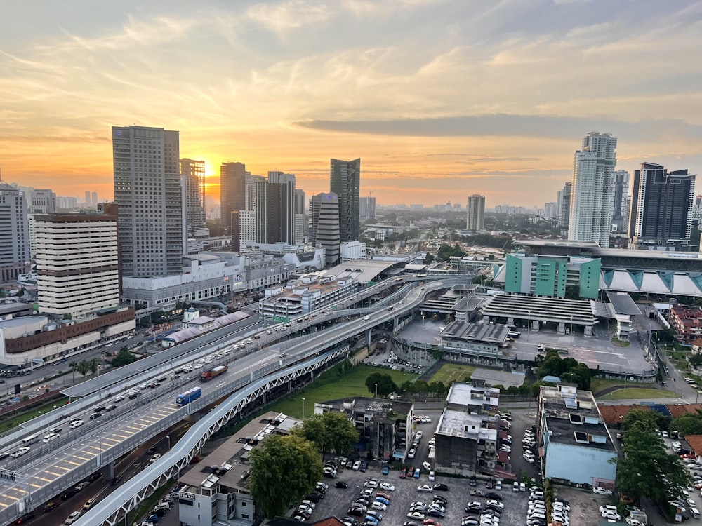 a city with a lot of tall buildings and lots of traffic