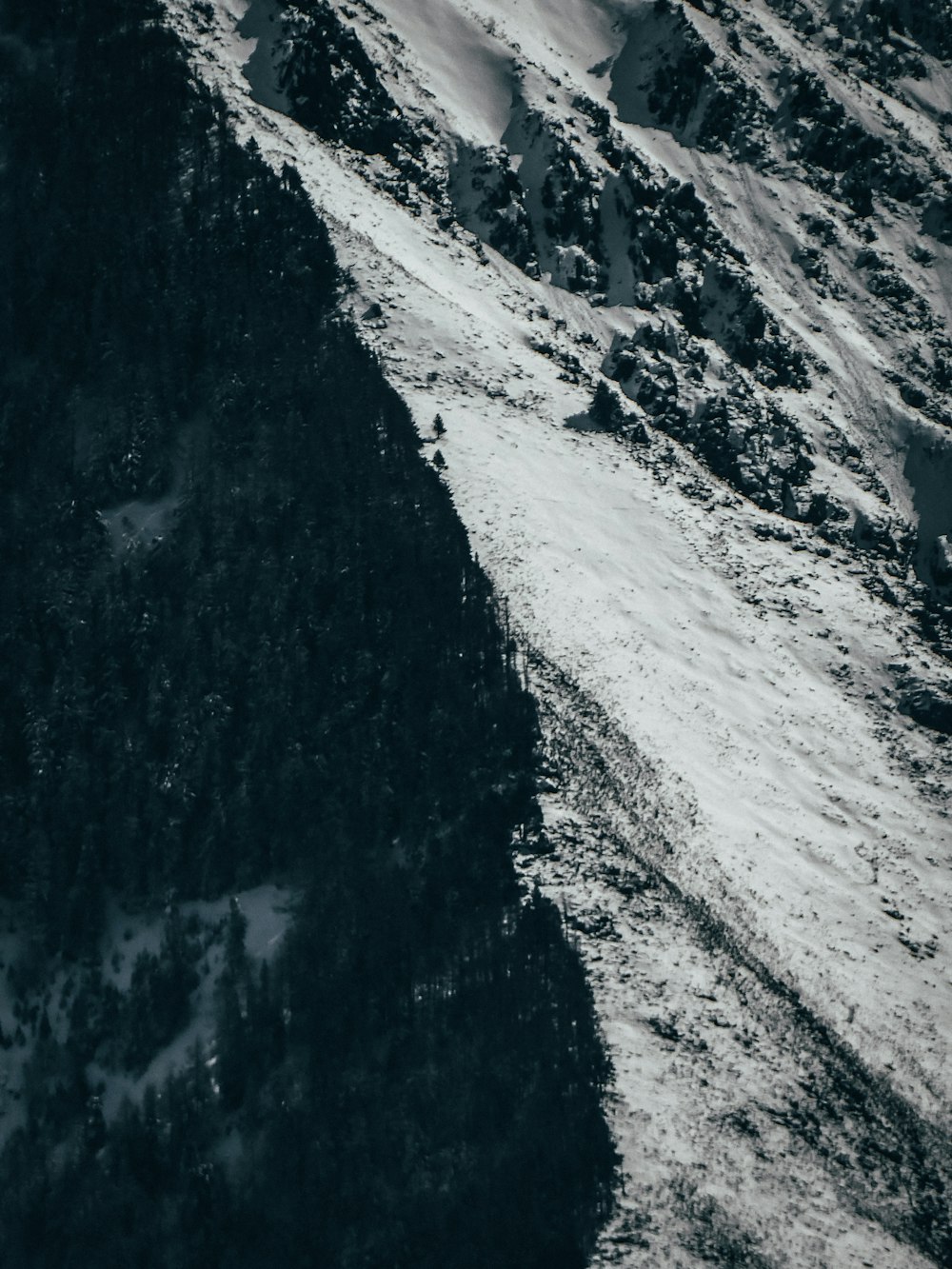 a person skiing down a snow covered mountain