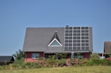 a house with a solar panel on the roof
