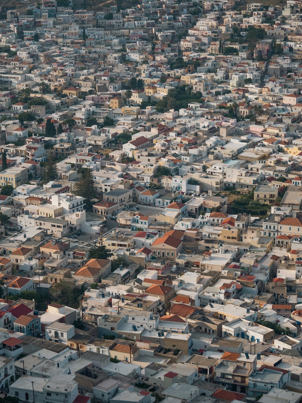 an aerial view of a city with lots of houses