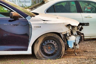 a car that is sitting in the dirt