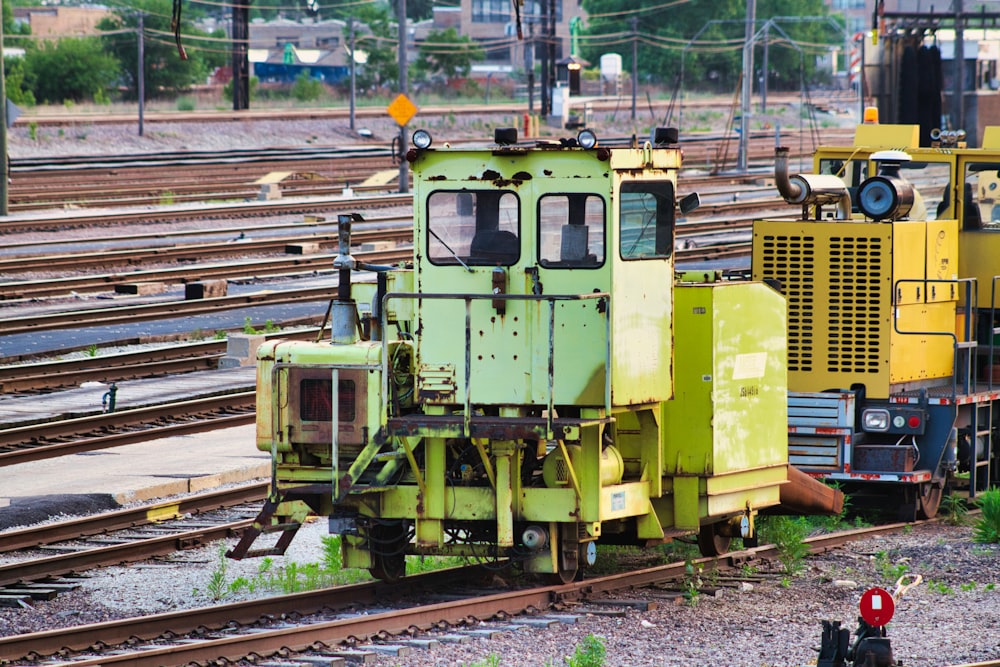 a couple of trains that are sitting on the tracks