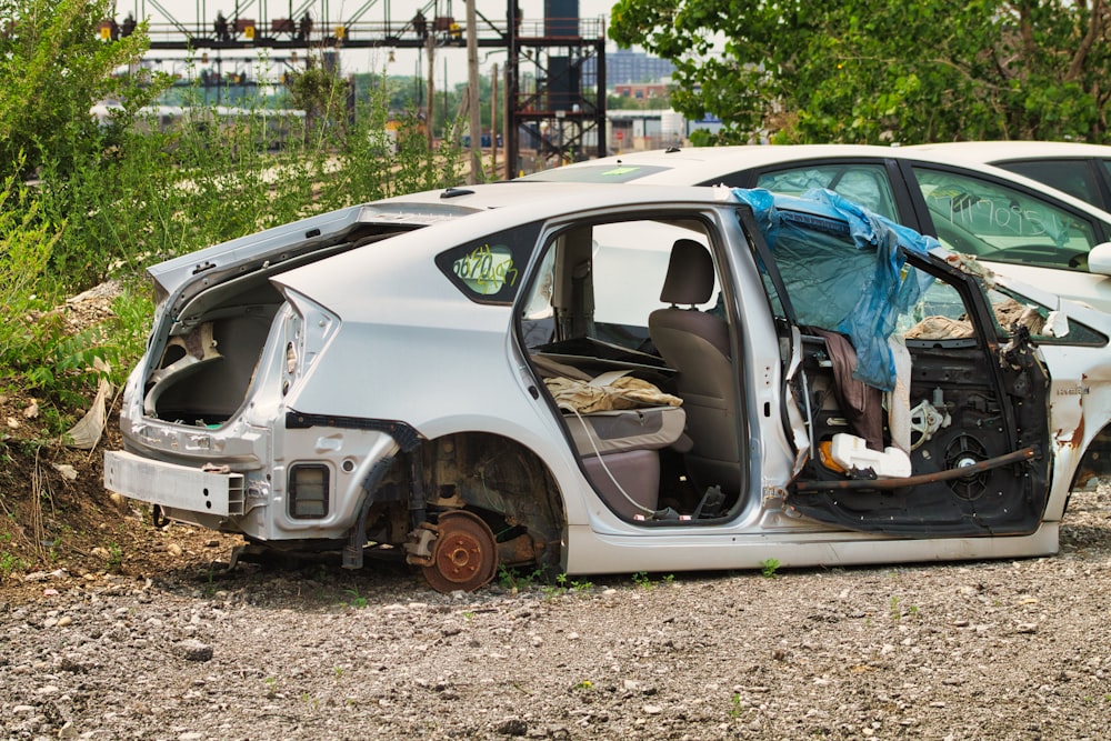 a car that is sitting in the dirt