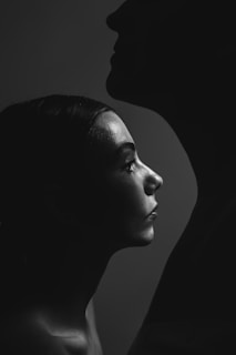 Side-by-side comparison of a patient's facial profile before and after orofacial harmonization.