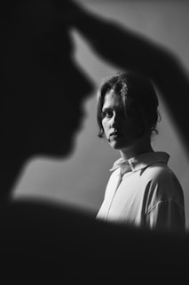 A portrait photo where the subject is crisply focused and the background is gently out of focus.