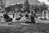 A peaceful morning scene with yoga mats laid out on the hostel’s open-air deck.