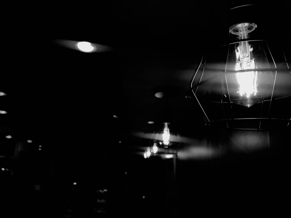 a black and white photo of a light fixture