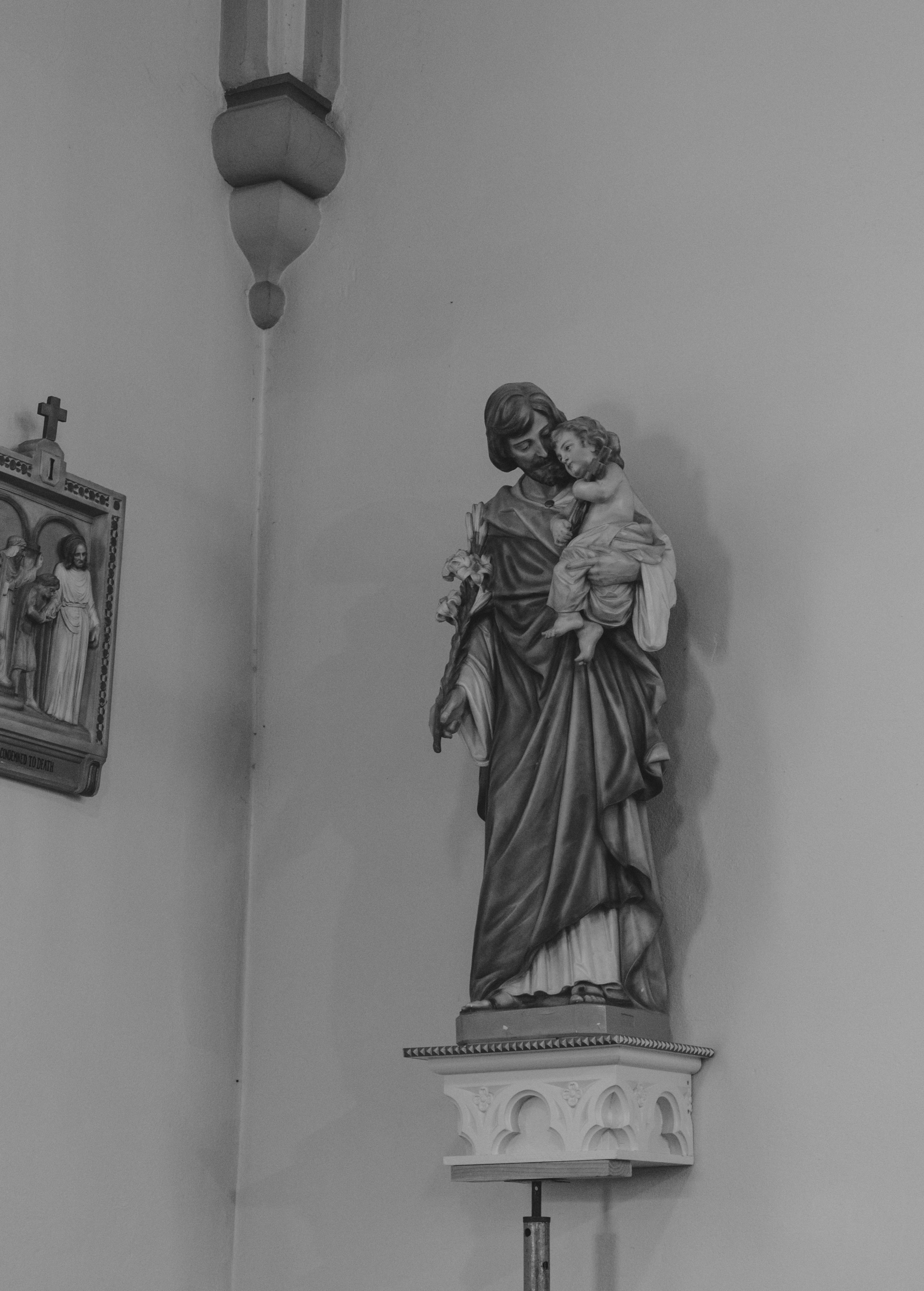 a statue of a woman holding a child