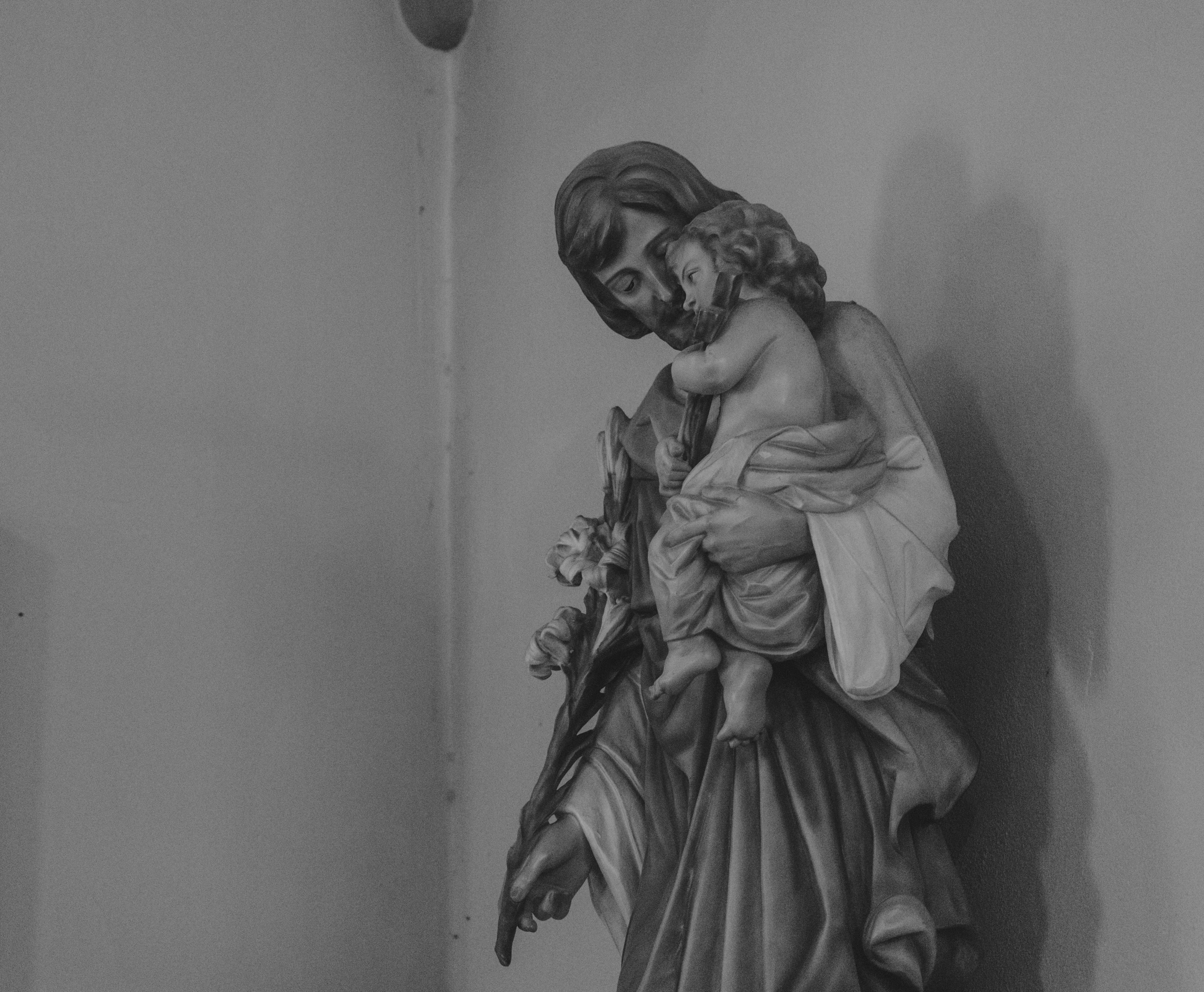 a statue of a woman holding a child