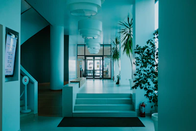 A clean, well-lit common area with polished floors and fresh paint.