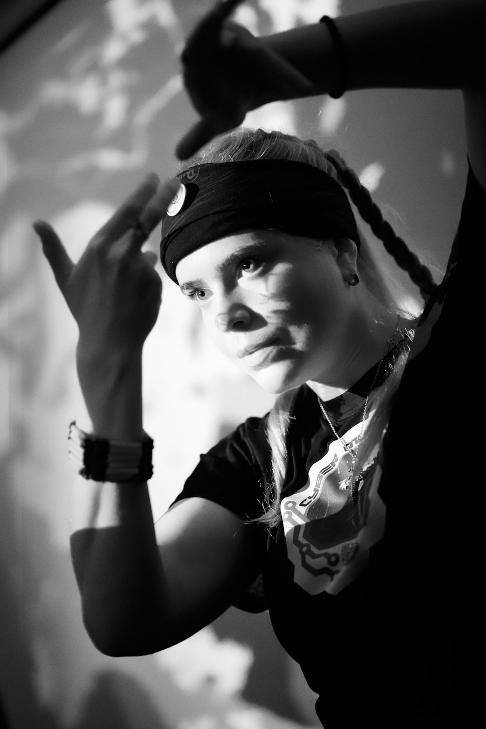 a woman with a bandana on her head