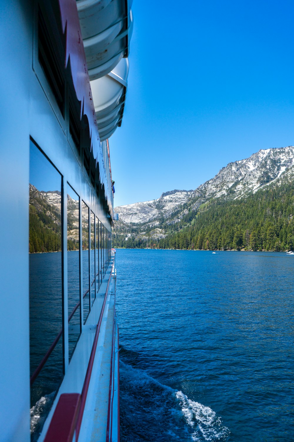 a boat traveling on a large body of water