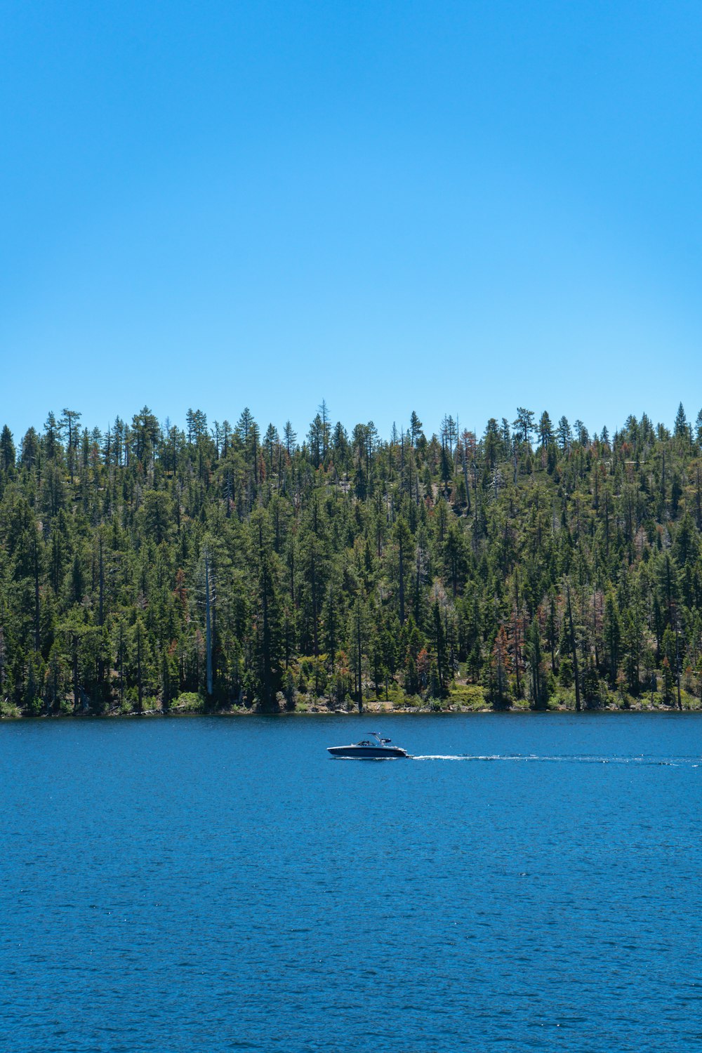 a boat in the middle of a large body of water