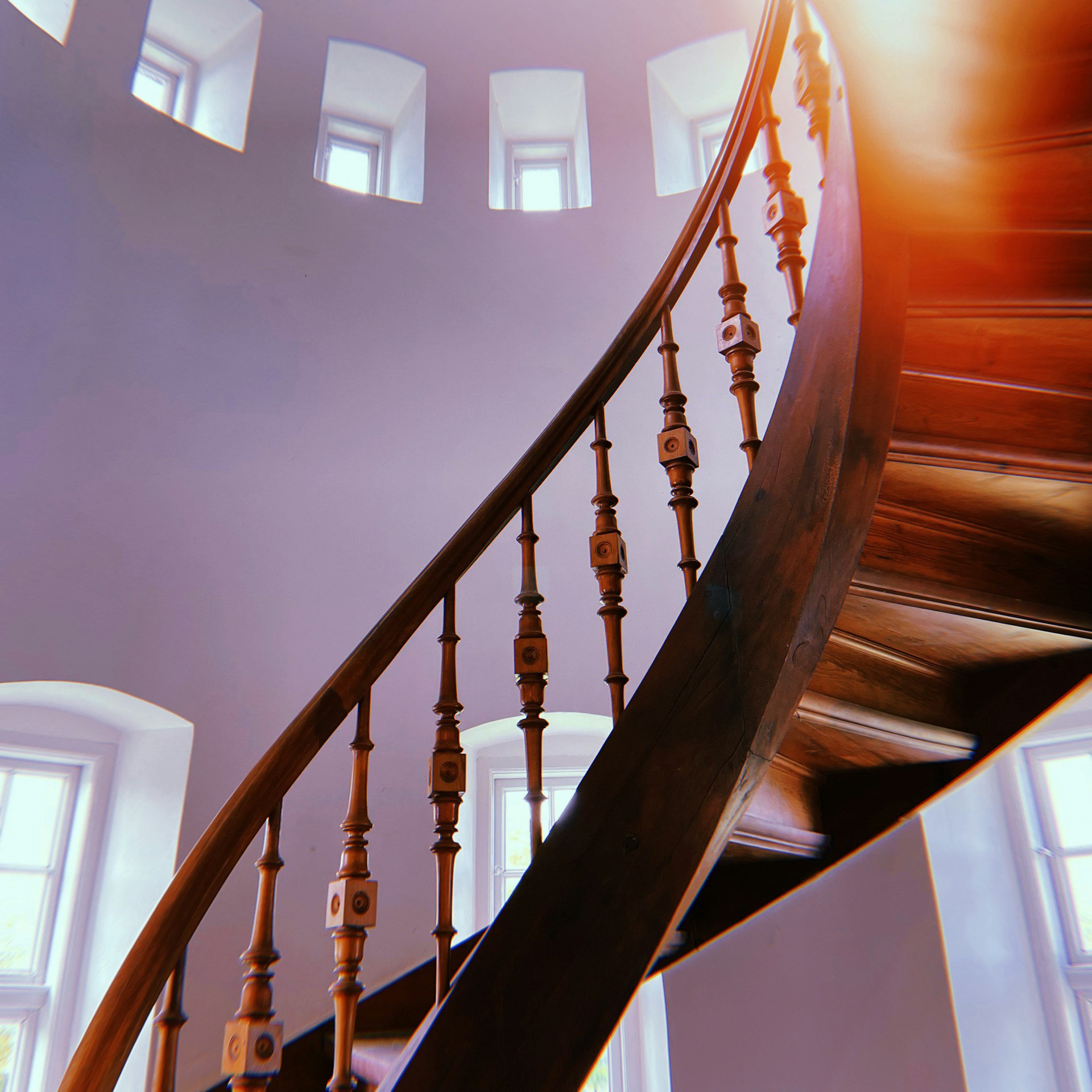 woman wearing yellow long-sleeved dress under white clouds and blue sky during daytime