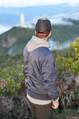 Technical outdoor jacket on mountain trail