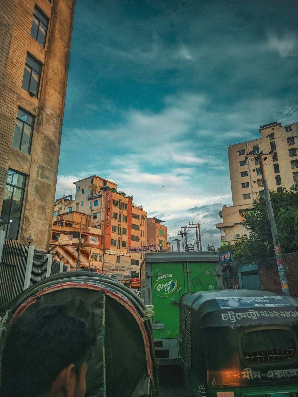 a city street filled with lots of tall buildings